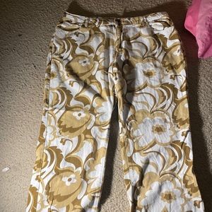 Jeans, they are brown, white, and beige. Brand new